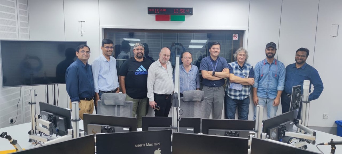 Melchior Busschers with a broadcast team in a control room.